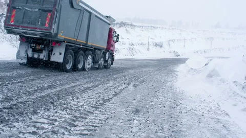 Mining dump truck driving on snowy road to coal cut in Siberia in Russia in wint 스톡 동영상 199486746