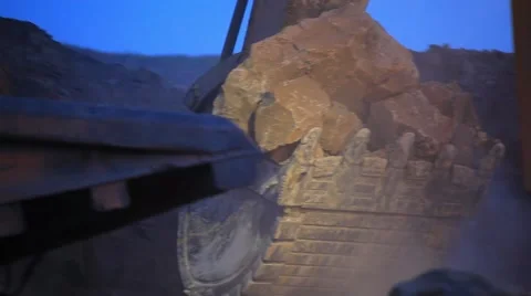  Mining dump truck loading by wheel loader. Excavator bucket Stock Footage 61851125