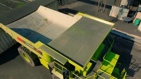 Mining dump truck parked near industrial factory loading area 스톡 동영상 332899791