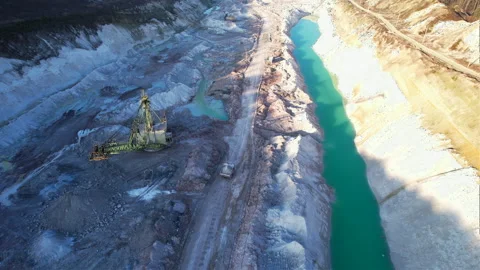 Mining dump truck transporting chalk rock from an open pit. 스톡 동영상 186502219