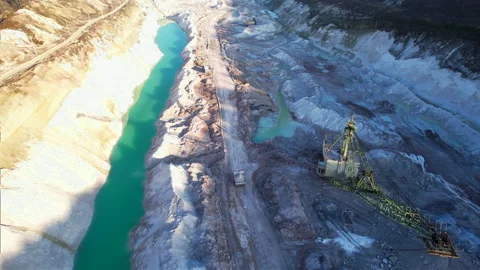 Mining dump truck transporting chalk rock from an open pit. Video stock 186503657