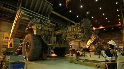 Mining dump trucks in processing plant Stock Footage 77129505