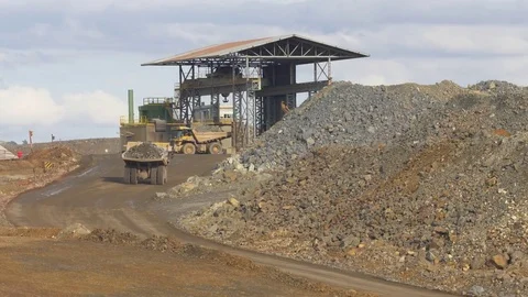 Mining dump trucks unloading Stock-Footage 81734220