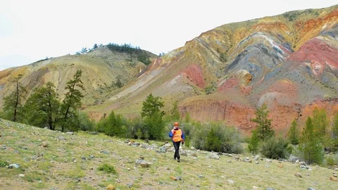 Mining engineer, a geologist in the protective reflective vest, gloves and Stock Footage 83490982