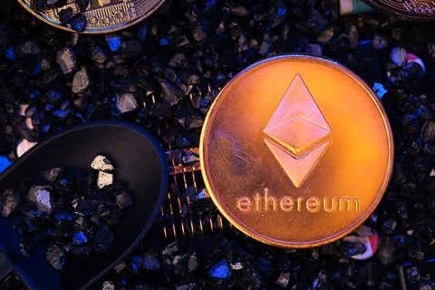 Mining ethereum crypto currency on circuit board.virtural money.blockchain .. Stock Photos