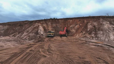 Mining Excavator Hitachi load sand in Belaz mining truck. Video stock 219725556