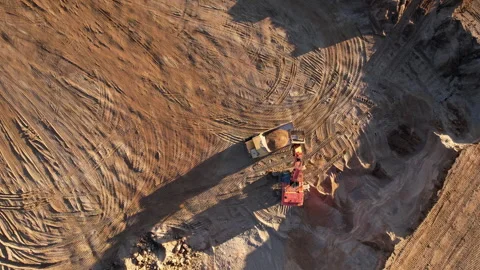 Mining excavator load the sand into dump truck in open pit. Видео 167043965