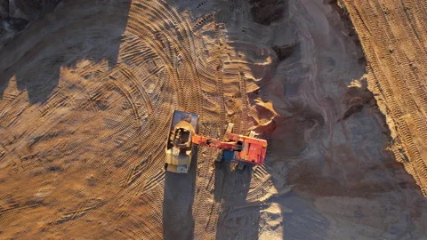 Mining excavator load the sand into dump truck in open pit. Stock-Footage 167044613
