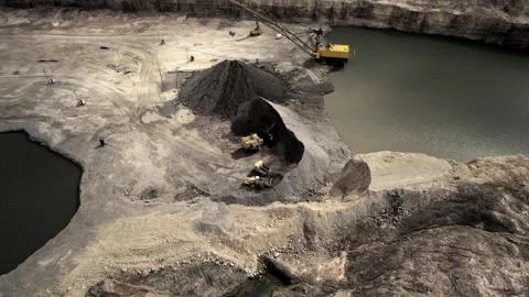 Mining excavator loading dolomite minerals in haul truck. Stock-Footage 194008830