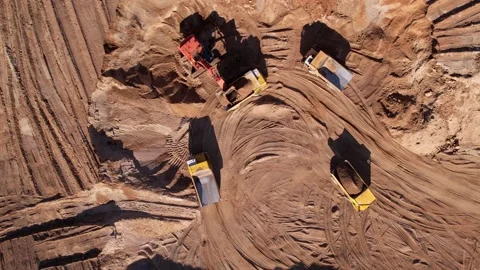 Mining excavator loads sand into mining truck. Excavator loads sand 스톡 동영상 195762823