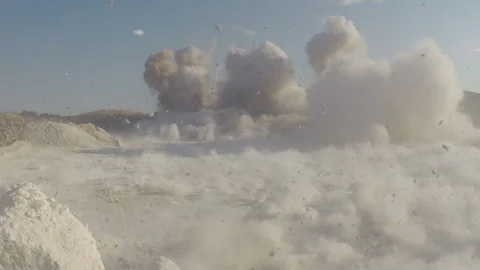 Mining explosion close up with debris Stock Footage 311089285