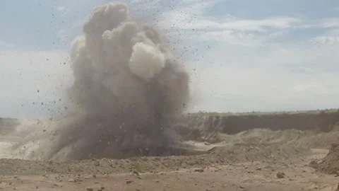 Mining explosion wide shot with debris Stock Footage 311089472