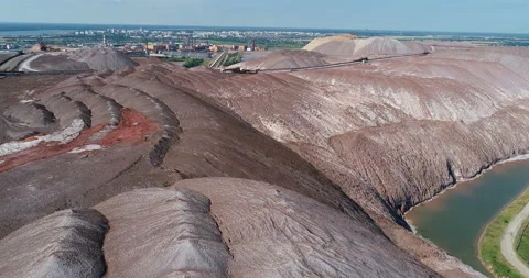 Mining industry. salt mountains. quarry filled with water. Stock Footage 100671934