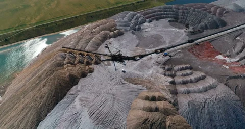 Mining industry. salt mountains. quarry filled with water. Stock Footage 100672305