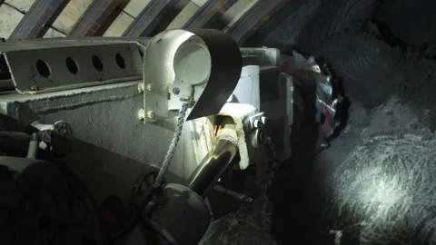 A mining machine cuts rock in a mine shaft 6 Stock Footage 279465883