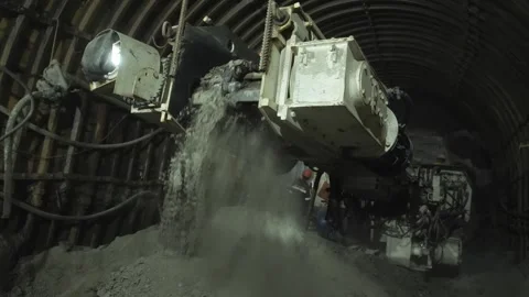 A mining machine cuts rock in a mine shaft Stock Footage 279465891