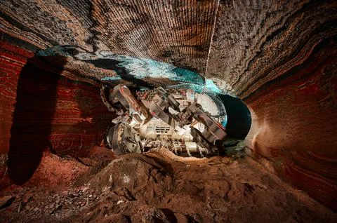 Mining machine with different saws in mineral quarry Stock Photos