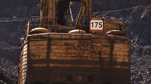 The mining of minerals with the help of an excavator in a pit Stock Footage 72815702