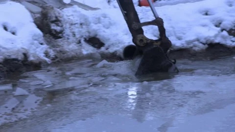 Mining Operation Excavator Bucket Scooping Ice 1 Stock Footage 154135900