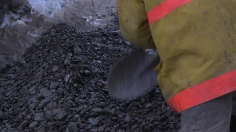 Mining Operation Slow Motion Miner Shoveling Gravel Stock Footage 154136303