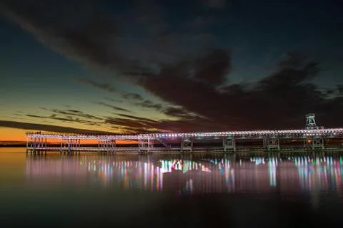 Mining pier known as the Tinto Dock "Muelle del Tinto" at close night . This is  Foto stock