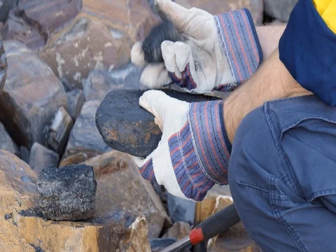 Mining prospect mineral exploration Geologist taking field rock data sample Video stock 78587337