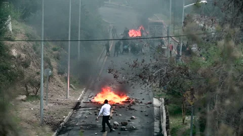 Mining Protest - Road Block - Uproar - Trucks dropping off tires Stock Footage 67573178
