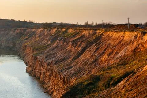 Mining quarry at sunset. Industrial Stock Photos