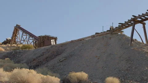 Mining Ruins with Ore Bin and Trestle at Nevada Ghost Town - Shallow DOF Stock Footage 144649688