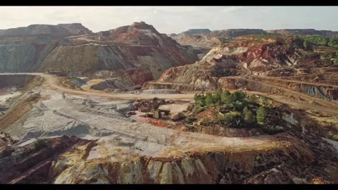 Mining site in action showing diverse landscapes and activities Video stock 320266976