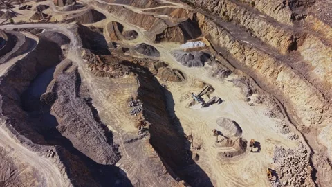 Mining site shows heavy machinery and earth movement Stock Footage 343124725
