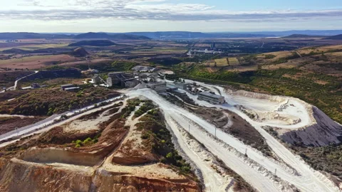 Mining site view showing machinery and landscape during daylight in rural area Stock Footage 345457315