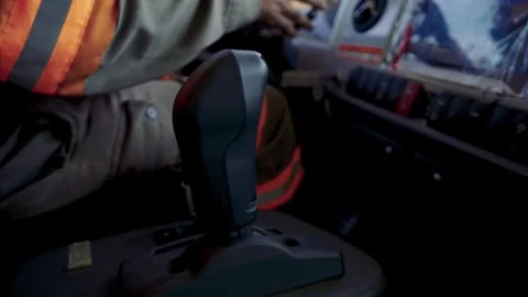 Mining truck cabin. Static closeup inside NHL TR50E, with driver on seat Stock Footage 332205864