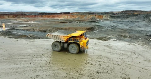Mining truck carrying load in open pit mine. Stock clip Stock Footage 312080097