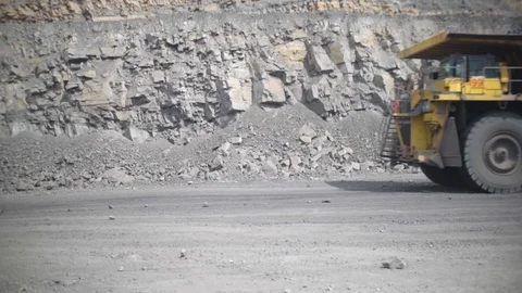 Mining truck with coal moves down the road Stock-Footage 114828059