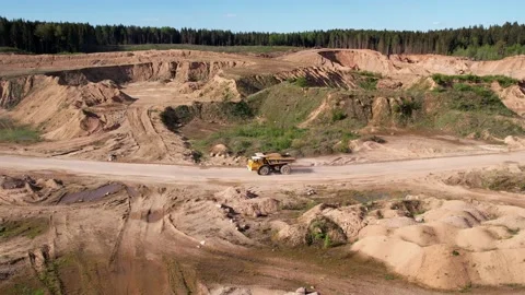Mining truck transportation sand in open-pit mine, drone view. Stock Footage 195756554