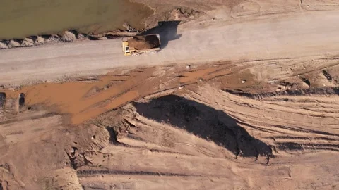 Mining truck transportation sand in open-pit mine, drone view. Video stock 195765673