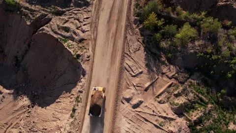 Mining truck transportation sand in open-pit mine, drone view. Video stock 195766862