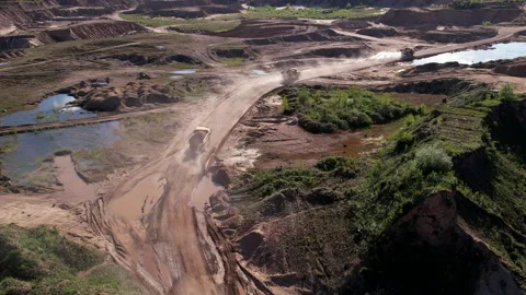 Mining truck transportation sand in open-pit mine, drone view. Video stock 195809129