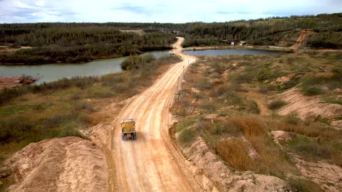 Mining truck transports limestone from opecast, drone view. Stock Footage 190873808