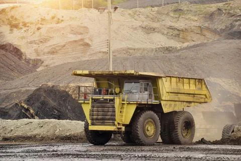 Mining Truck,Open pit mining of iron ore and magnetite ores.Loading the iron  Stock Photos