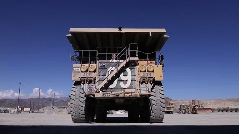 Mining trucks driving Stock Footage 77101290