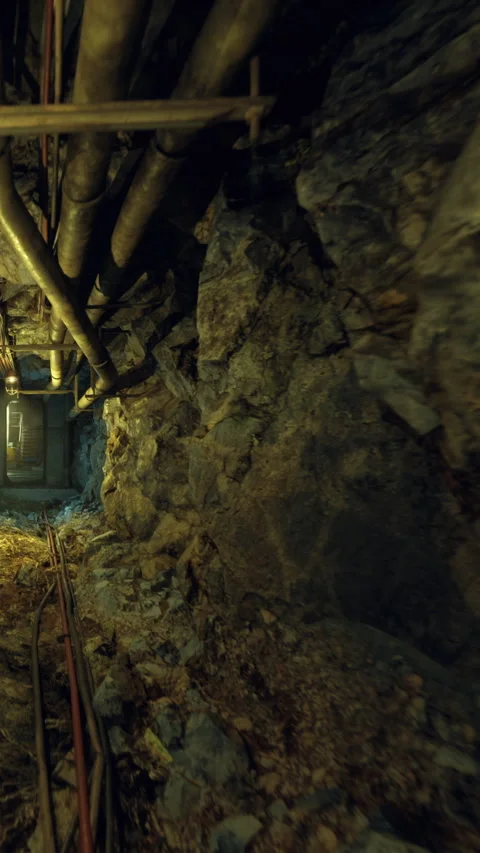 Mining tunnel in a dark underground area during evening hours Stock Footage 339944717