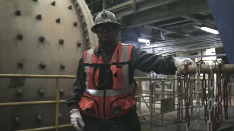 Mining Worker Beside Grinding Mill at El Teniente Plant Stock Footage 339378256