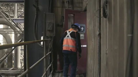 Mining Worker Entering Industrial Area at El Teniente Copper Mine Stock Footage 339378242