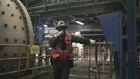 Mining Worker Using Radio Near Grinding Mill Operations Stock Footage 339378267