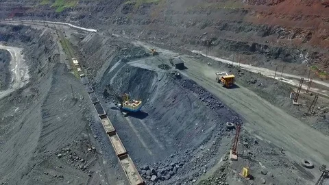 Mining works Excavator Electric locomotive bulldozer overload Stock Footage
