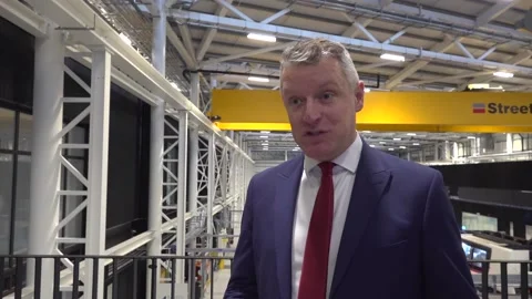 Minister calls for 'defence to be an engine for growth' during Paisley visit Stock Footage 327685958