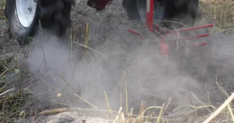 Minitractor tillerblock plows the ground. Stock Footage 220729426