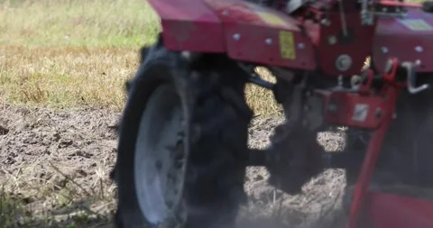Minitractor tillerblock plows the ground. Stock Footage 220729453